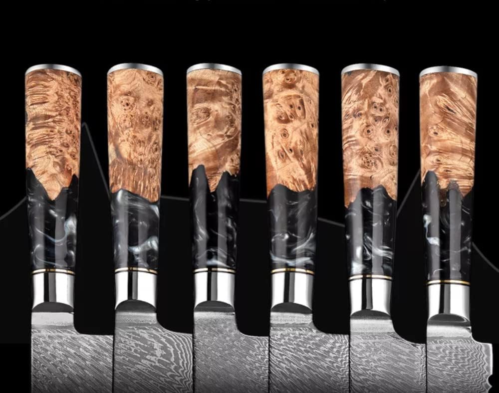 Close-up of black burl resin handle on Tidal Collection Damascus chef knife