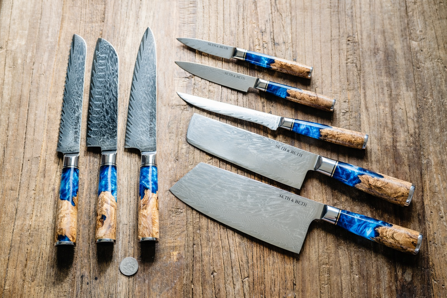 Blue burl handle close-up on personalized engraved Damascus knife — Tidal Collection