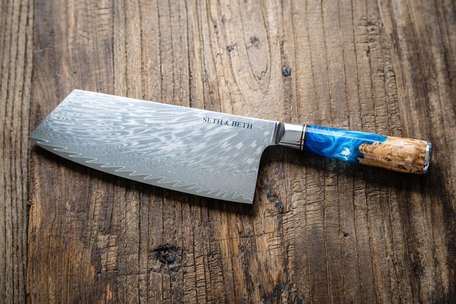 Blue burl handle close-up on personalized engraved Damascus knife — Tidal Collection